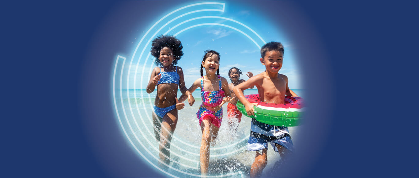 BayCare effect logo with children playing on the beach
